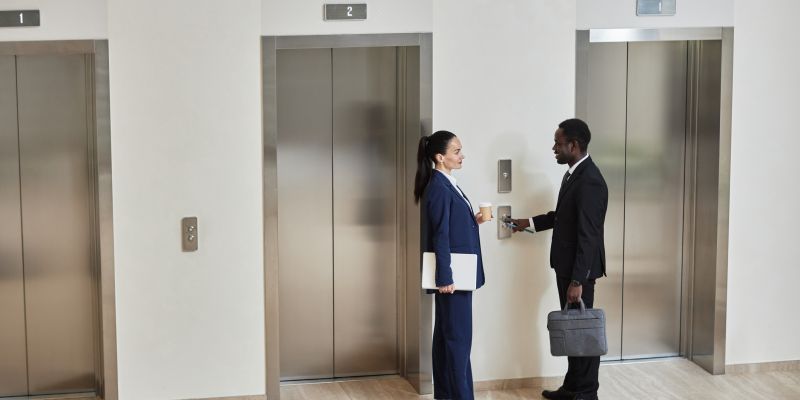 Businesspeople Waiting for Elevator